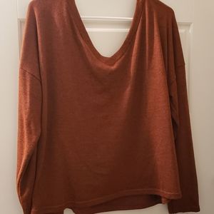 Ladies sweater in rusty orange size L